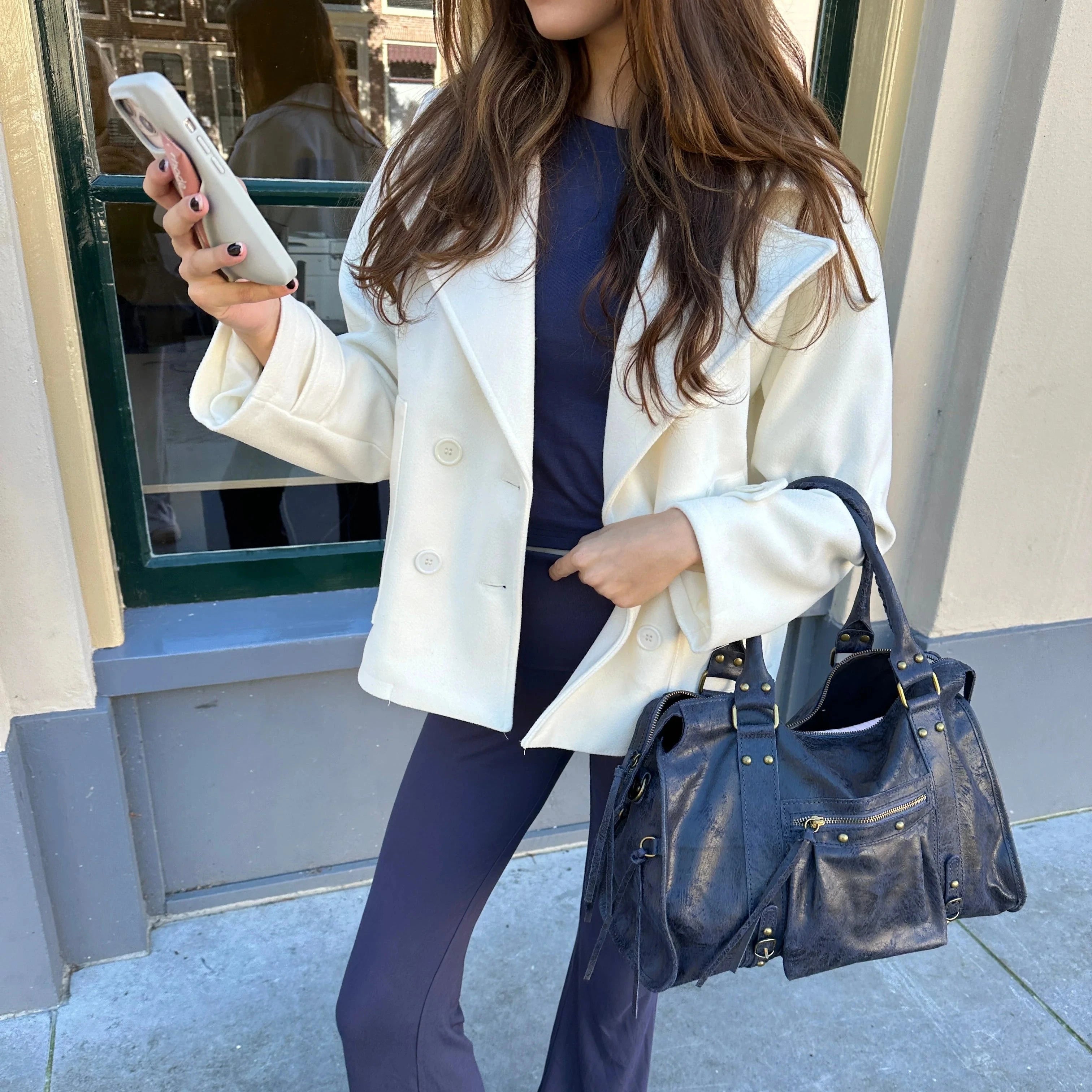 Evaëlle - Studded shoulder bag